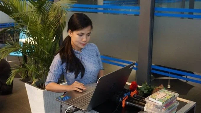 Bùi Tuyết Minh tại nơi làm việc